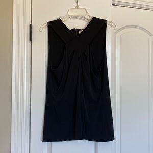 Black sleeveless top with crisscross front